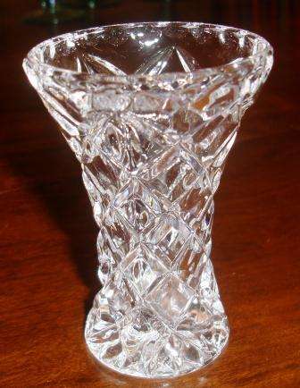 Crystal vase. Approx. 10cmH x 7cmw at mouth x 5cmW at base