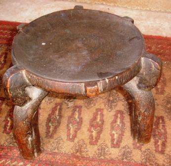 Wooden Hand carved stoolSmall..Made in Dares salaam. Circa 1930.Approx. 32D x 24H