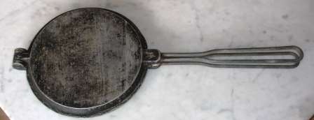Retro Cast Iron stove top waffle maker.Approx.40cmL x 18cmW