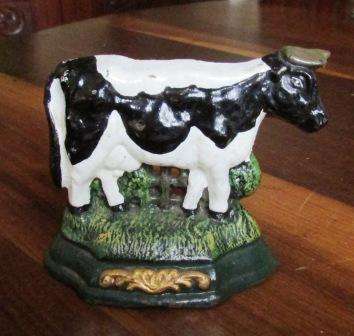 Retro cast iron "Cow" door stopper.