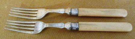 EPNS bone handled forks x 2. Approx. 17.5cml. Circa 1896