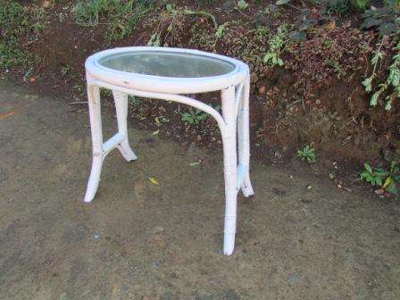 Retro Oval Glass Topped Cane Side Table. Approx. 40 L x 33 W x 43 cm H