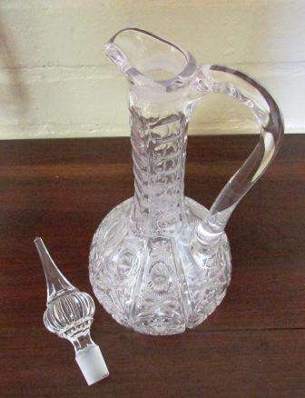 Vintage crystal hand cut decanter. Approximately D13cms x 40cms high