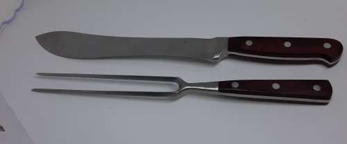Carving set with Wood Handles. Knife approximately 34 cms long