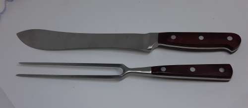 Carving set with Wood Handles. Knife approximately 34 cms long