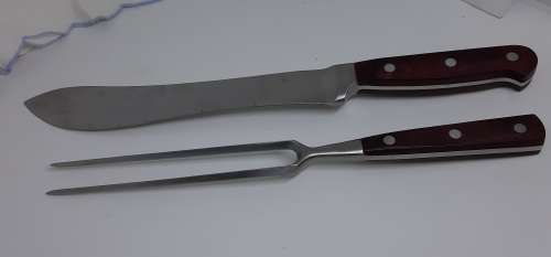 Carving set with Wood Handles. Knife approximately 34 cms long