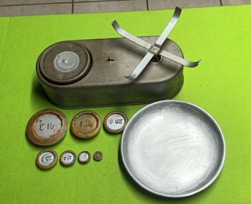 `Harper` kitchen Scale with weights circa 1 950`s  metal balance scale with 6 x weights