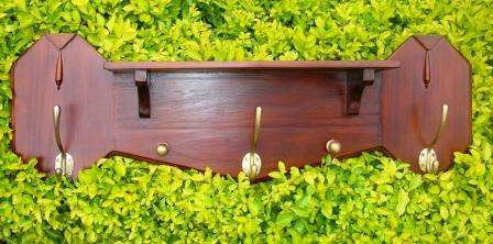 Wall shelf could be used for hanging handbags or