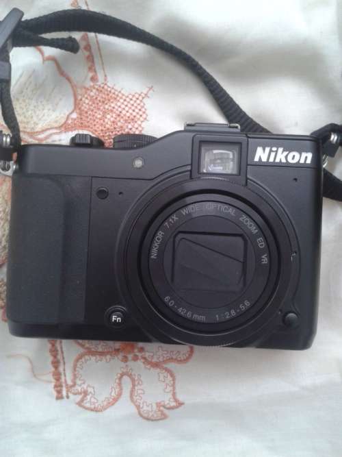 Nikon Coolpix P7000 10.1 MP Digital Camera with 7.1x Wide Zoom-Nikkor ED Lens and 3-Inch LCD