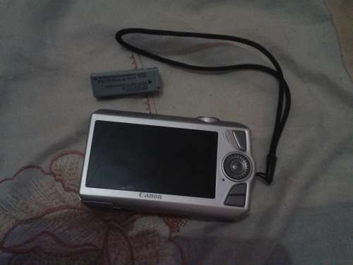 Canon IXUS  1000 HS Digital Camera -  (10.0 MP, 10x Optical Zoom)