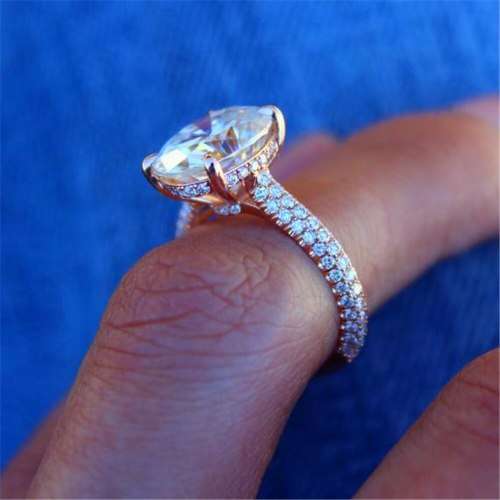 Ladies oval 5Cts Zircon Rose gold Ring, embellished with small zircons