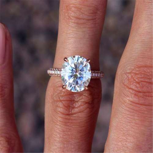 Ladies oval 5Cts Zircon Rose gold Ring, embellished with small zircons