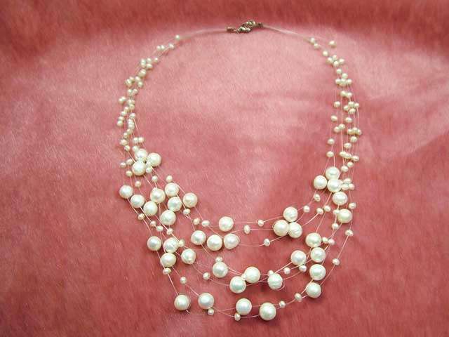 Floating pearl necklace