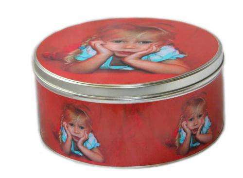 Photo tin - your family or your pet on the tin.  Excellent quality. Get them now before Christmas