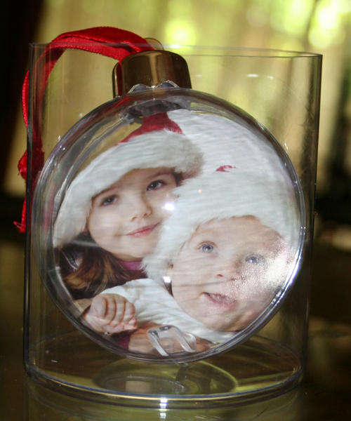 Photo Christmas baubles. Look at the personalized Christmas crackers also available