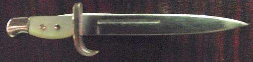 CHROME PLATED DAGGER LAPEL/BREAST BADGE