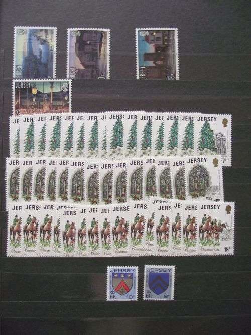 GREAT BRITAIN QE II JERSEY & GUERNSEY MINT NEVER HINGED LOT ON 10 PAGES