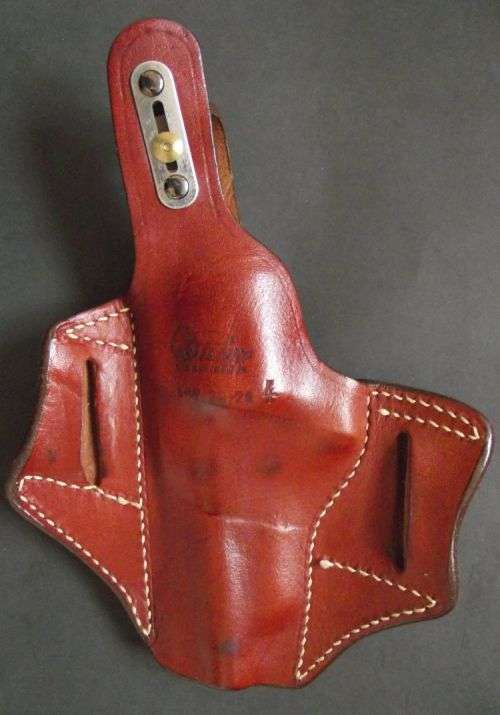LEATHER GUN HOLSTERS FOR A REVOLVER & PISTOL