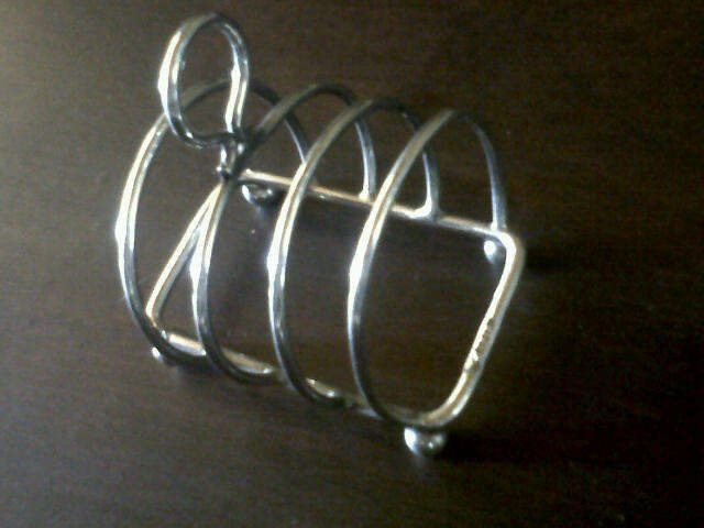 ANTIQUE SOLID STERLING TOAST HOLDER