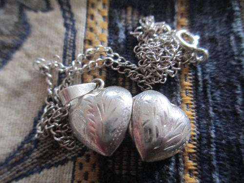 VINTAGE ENGRAVED PICTURE LOCKET PLUS STERLING SILVER CHAIN.  4.3 GRAMS 925