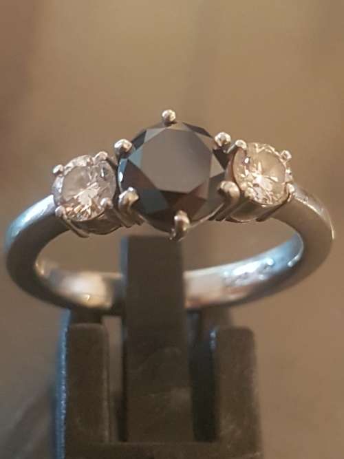 Stunning and elegant Platinum white and black diamond ring. Please read description