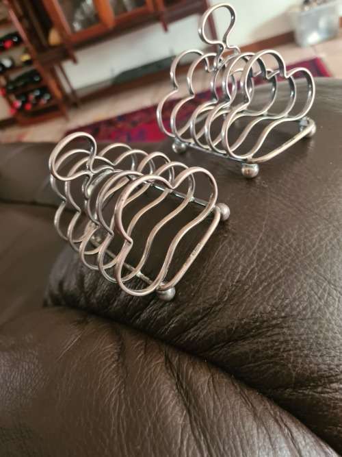 2 x Antique sterling silver toast racks. Weight a heavy 179, 21 grams sterling silver