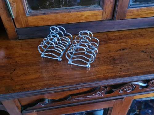 2 x Antique sterling silver toast racks. Weight a heavy 179, 21 grams sterling silver