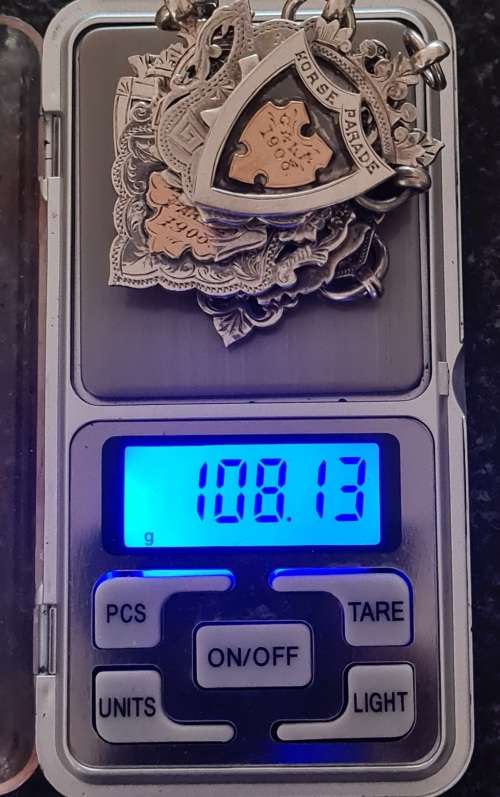 Zar gold and sterling silver medals. Weight 108.13 sterling with solid 9ct gold inlays