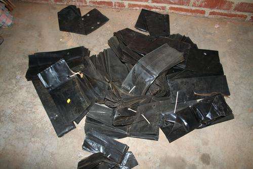 Assorted Black plastic bag planters - plenty - have not counted est 100 +