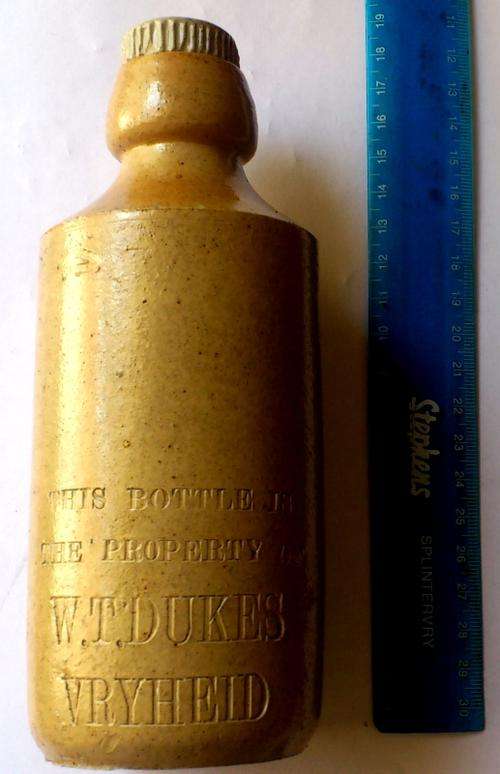 SCARCE W.T. DUKES VRYHEID GINGER BEER BOTTLE WITH SCREW IN TOP