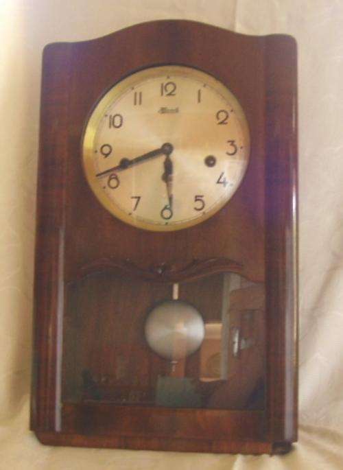 HERMLE WALL CLOCK - RUNS WELL - CHIMES EVERY QUARTER HOUR..