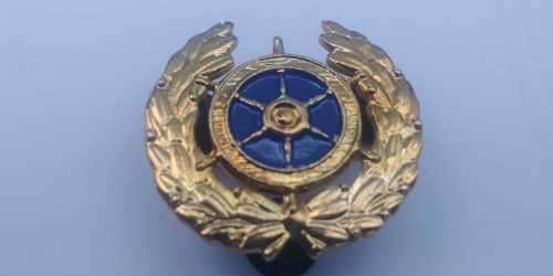 S.A. Navy Coxswain Master at Arms Brest Badge with blue center.