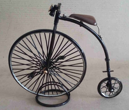 Penny Farthing. Bicycle. Metal model .