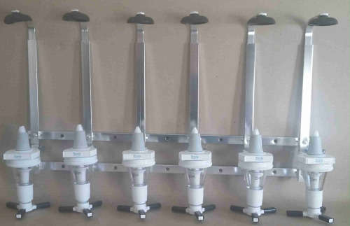 Set Six units asized commercial optic spirit dispenser.                                  bw1