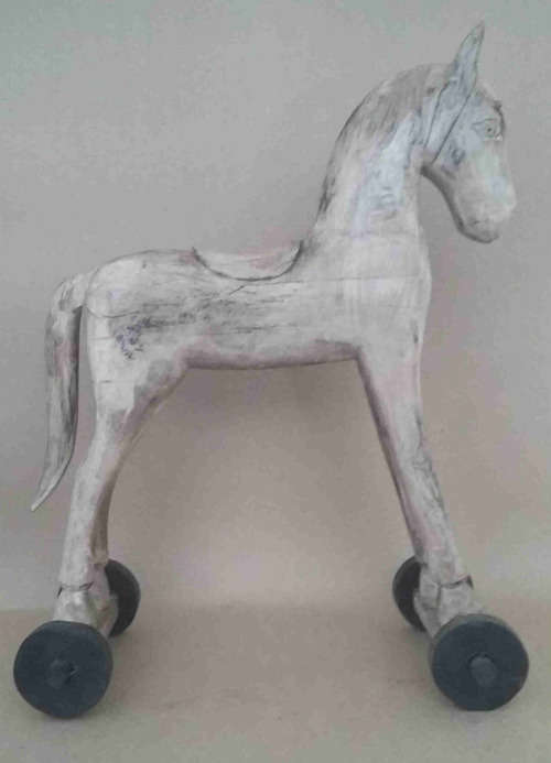 Wooden horse on wheels