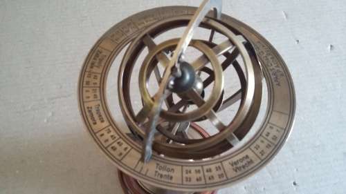 Armillary globe on base. Beautiful item to complement your home