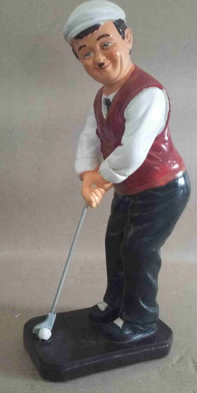 Golfer figurine. Heavy