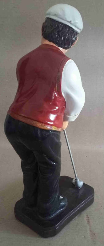 Golfer figurine. Heavy