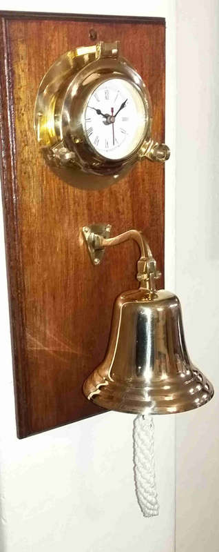 Solid brass bell and nautical clock. Bell 15cm diameter clock 15cm