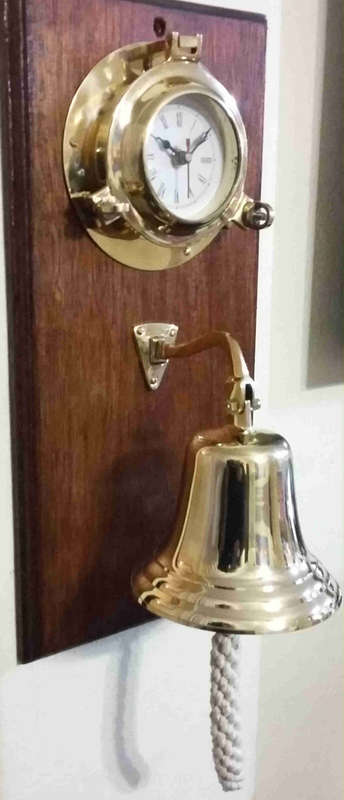 Solid brass bell and nautical clock. Bell 15cm diameter clock 15cm