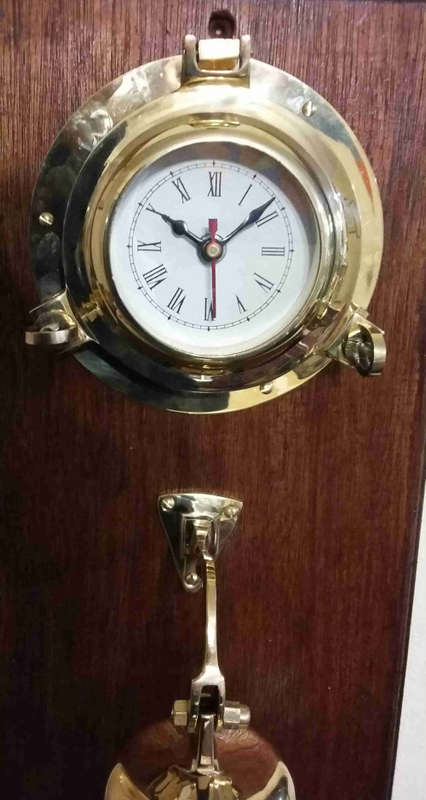 Solid brass bell and nautical clock. Bell 15cm diameter clock 15cm