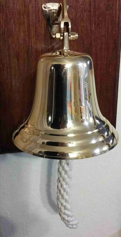 Solid brass bell and nautical clock. Bell 15cm diameter clock 15cm