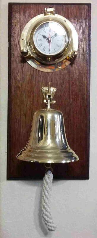Solid brass bell and nautical clock. Bell 15cm diameter clock 15cm