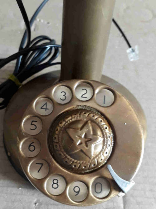 Stick telephone.