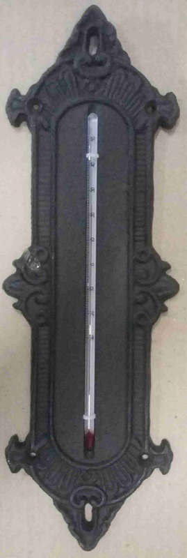 Cast iron  thermometer.