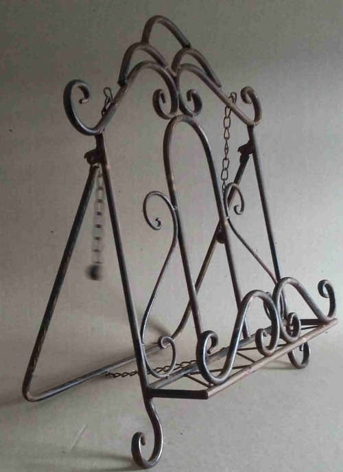 Wrought metal book stand.
