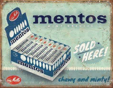 Mentos sold here distressed metal sign