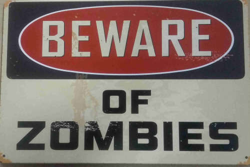 Beware of Zombies metal sign.
