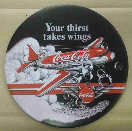 Coca-Cola your Thirst Takes Wings metal sign