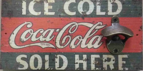 coca cola, ice cold Advert board with bottle cap opener.